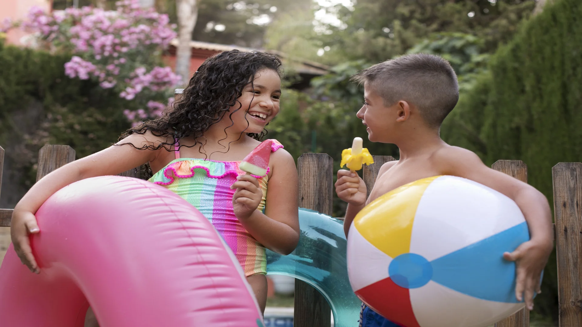 children-having-fun-with-floater-by-pool